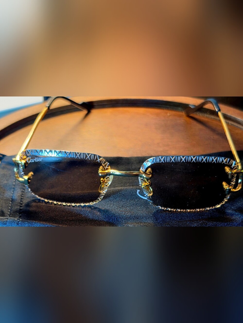 Cartier Men’s Gold Rimless Sunglasses with Black Lenses and Etched Trim
